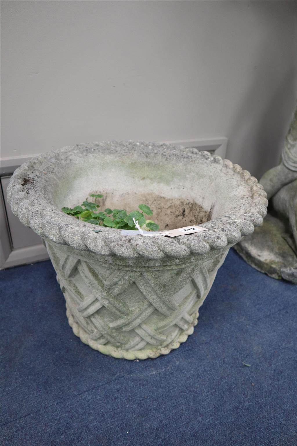 A pair of reconstituted stone basketweave planters, diameter 53cm, height 39cm